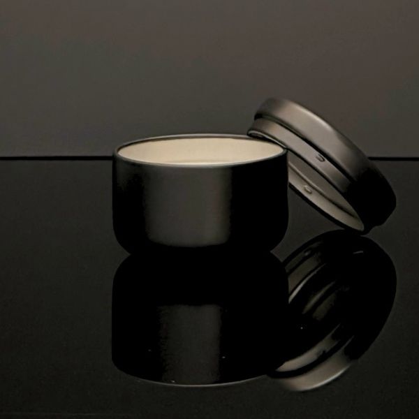 Discovery Candle Against Black Background