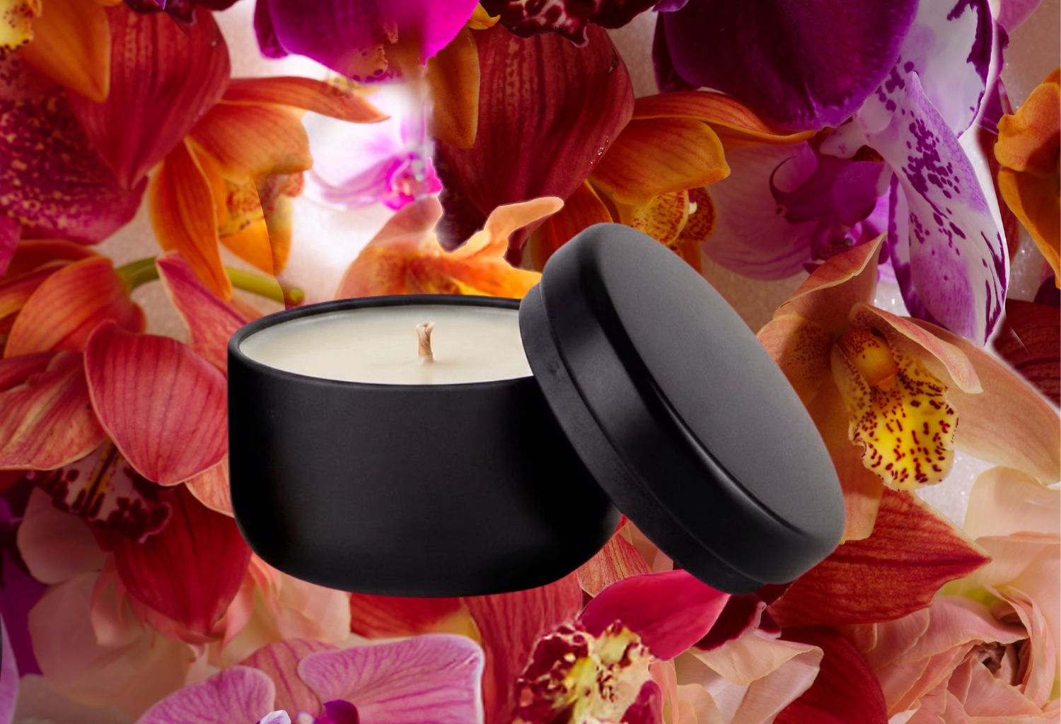 Black travel candle against a floral background